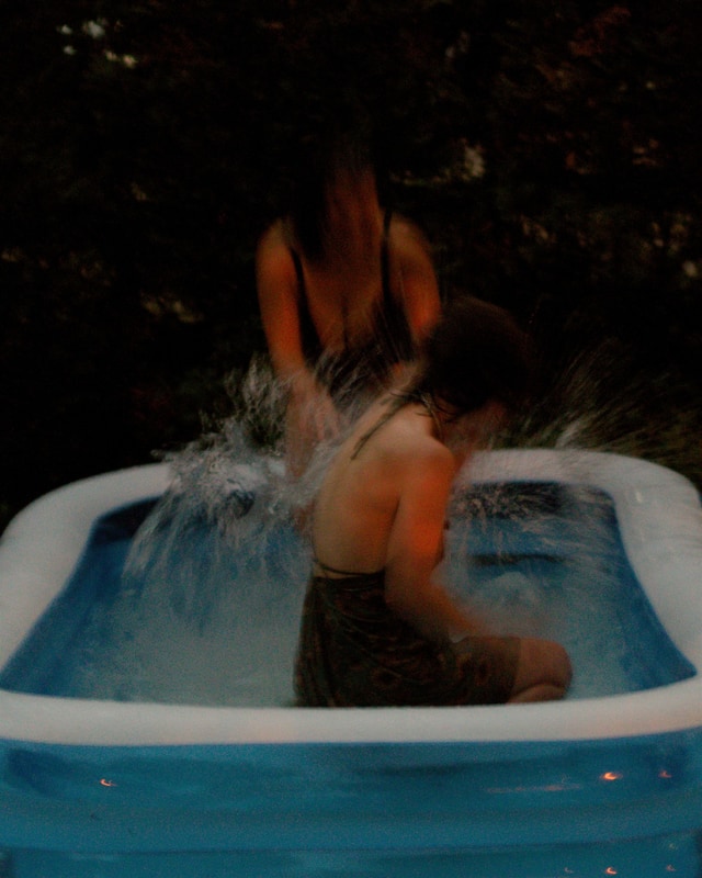 Series: water — splash erupting from a night pool